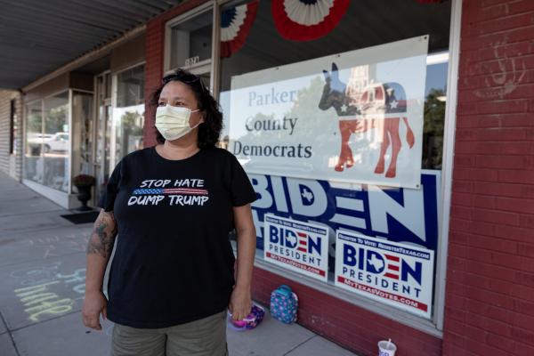9/25/20-Weatherford,Texas - Beth Scott, An Weatherford, Texas resident and member of Parker County Resistance, stands in front of a voter registration building to register more democrats on the Main Street of Weatherford, Texas.