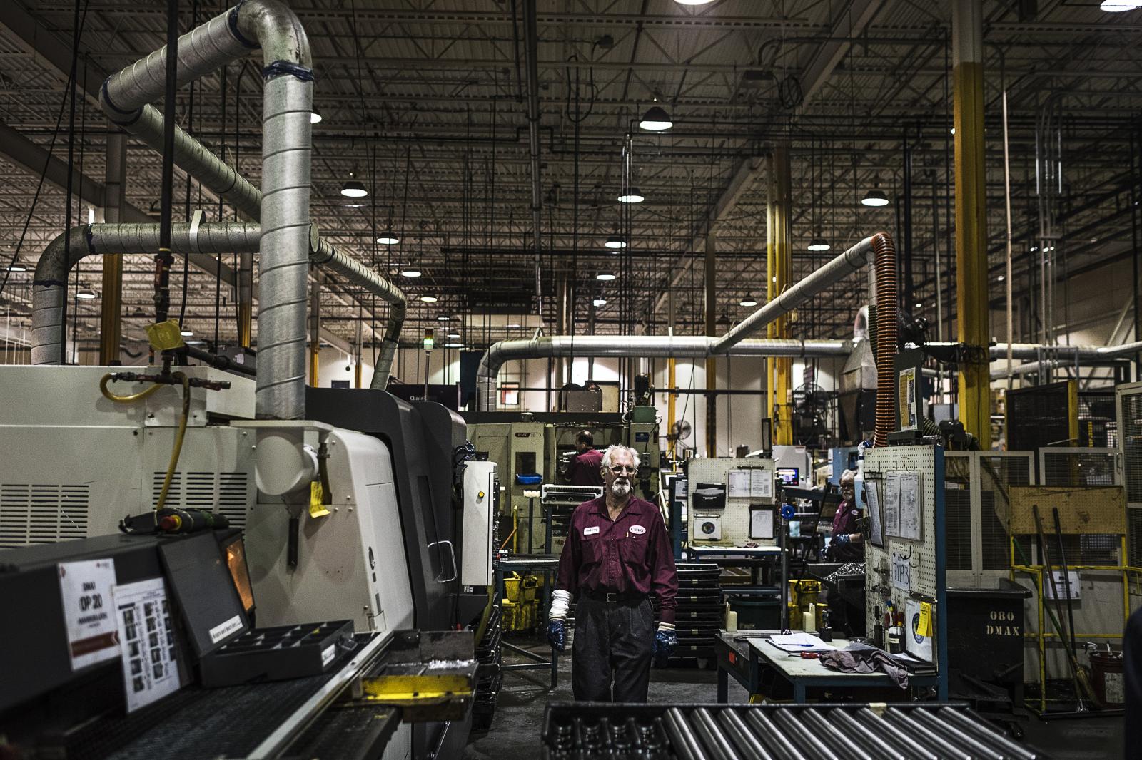 Workers manage the production o...Elkaim for the New York Times. 