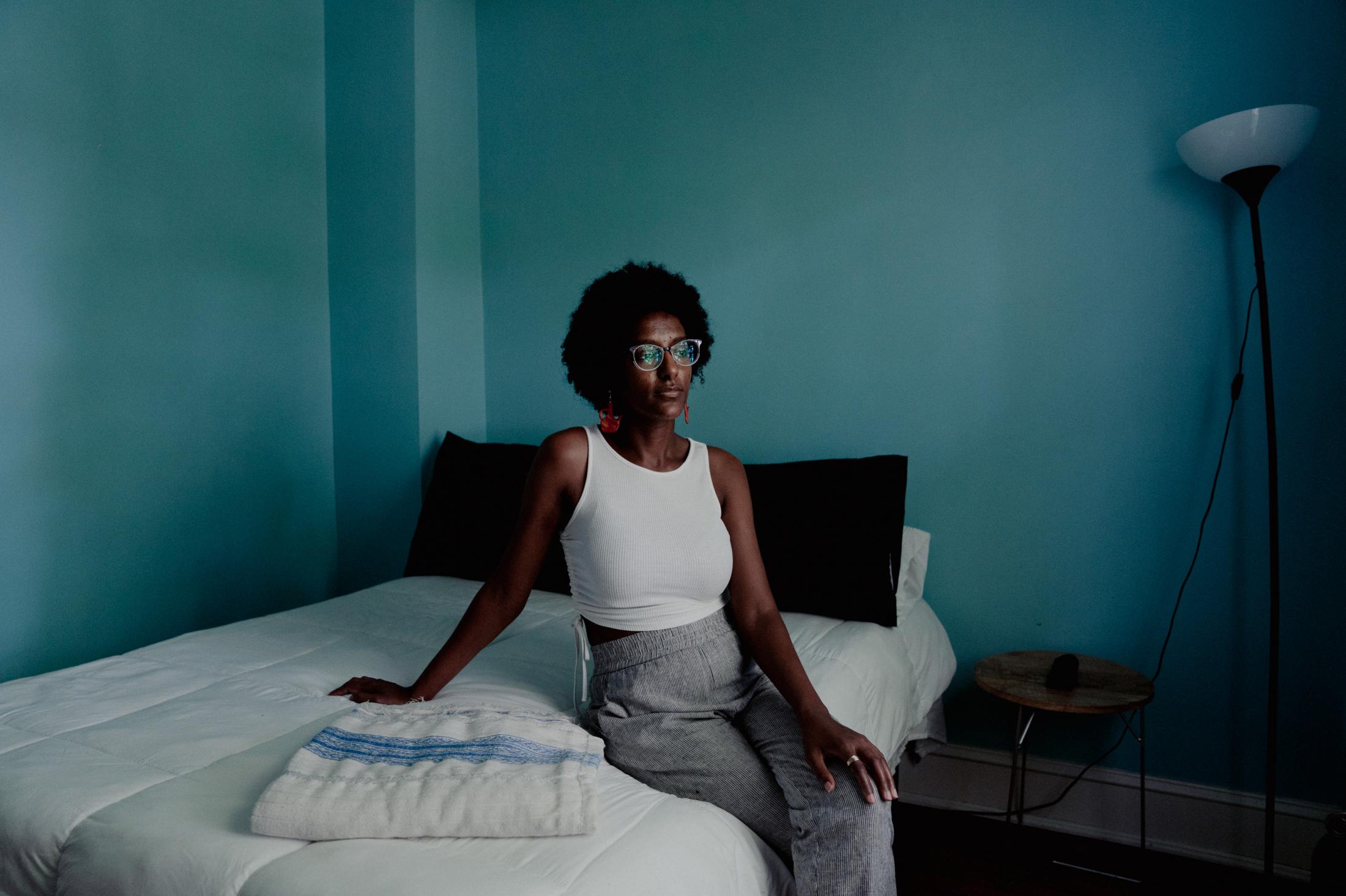 Freweyni Asress, an activist who writes a 5-day diary to give readers a look into her sustainable lifestyle, sits for a portrait in her house in...