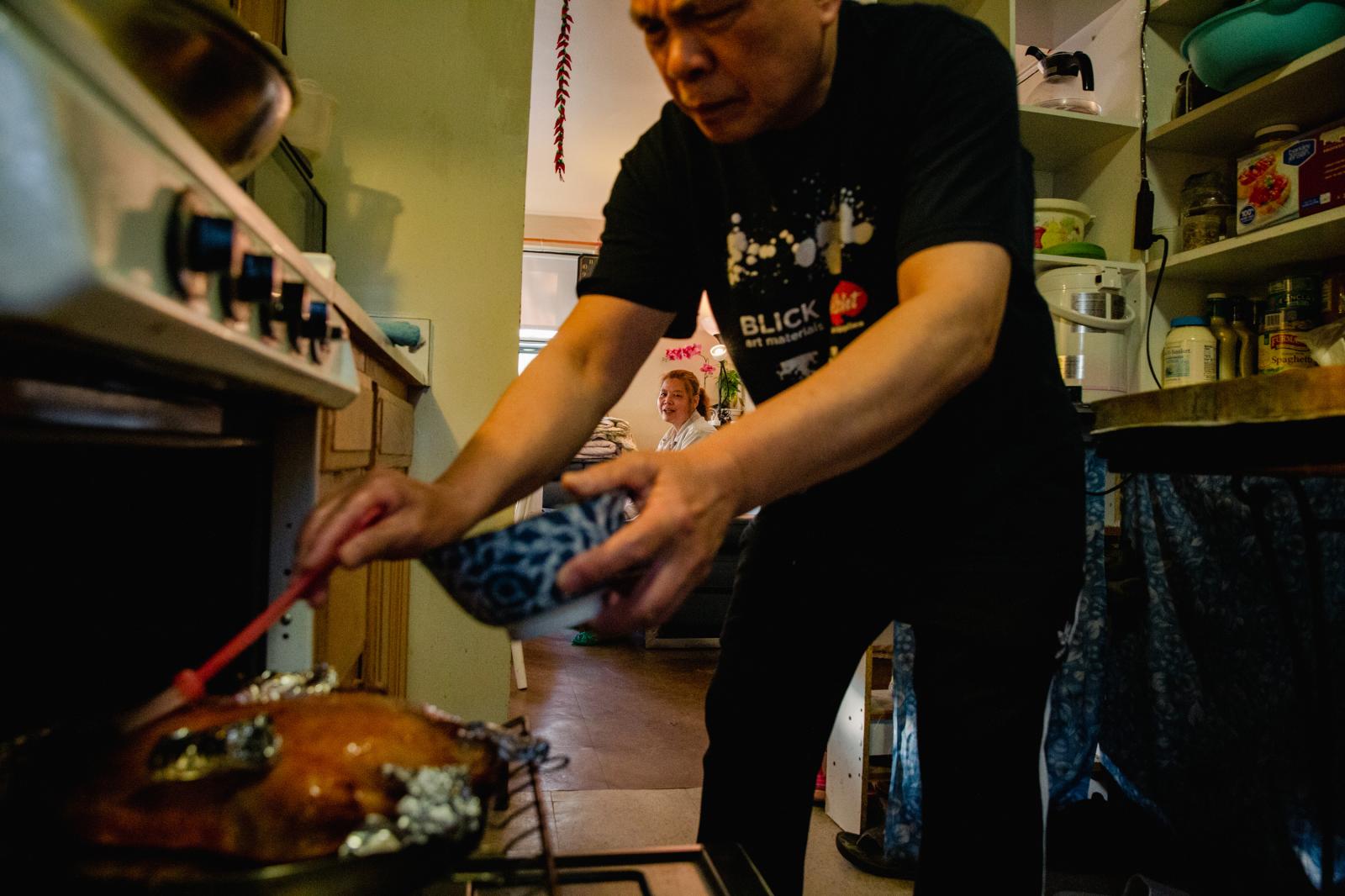 Image from NPR: Two Cantonese Women's Journey: A response to Atlanta Spa Shootings -  After work, Liang usually spends time making food with...