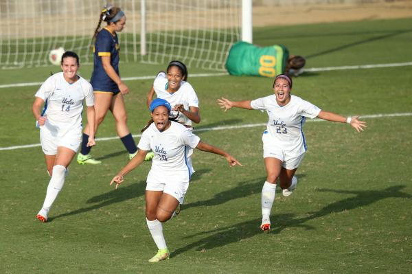 LOS ANGELES, CALIFORNIA - OCTOBER 31: Mia Fishel #10, Olivia Athens #14, Reilyn Turner #66, and Marley Canales # 23 of UCLA celebrate after Turner&#39;s goal in the second overtime period to win against California Bears at Wallis Annenberg Stadium on October 31, 2021 in Los Angeles, California. (Photo by Katharine Lotze/Getty Images) **PPAGLA&#39;s Best UCLA Sports Photo 2022