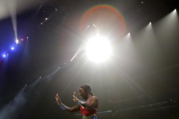 LOS ANGELES, CALIFORNIA - SEPTEMBER 25: Simone Biles performs during the Gold Over America Tour at Staples Center on September 25, 2021 in Los Angeles, California. (Photo by Katharine Lotze/Getty Images)  