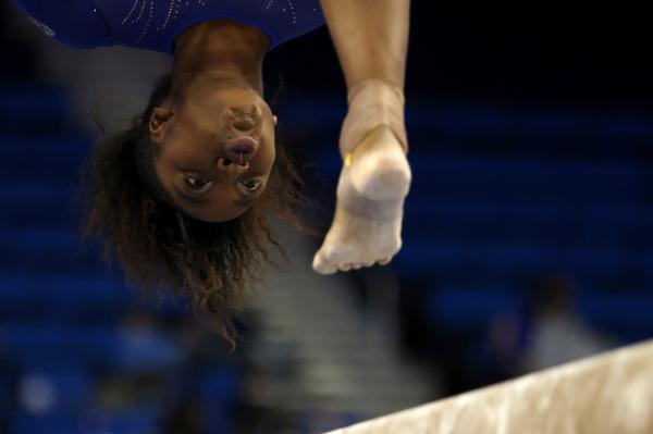 LOS ANGELES, CALIFORNIA - MARCH 06: Chae Campbell of the UCLA Bruins competes on beam during a meet against the California Golden Bears at UCLA Pauley Pavilion on March 06, 2022 in Los Angeles, California. (Photo by Katharine Lotze/Getty Images)