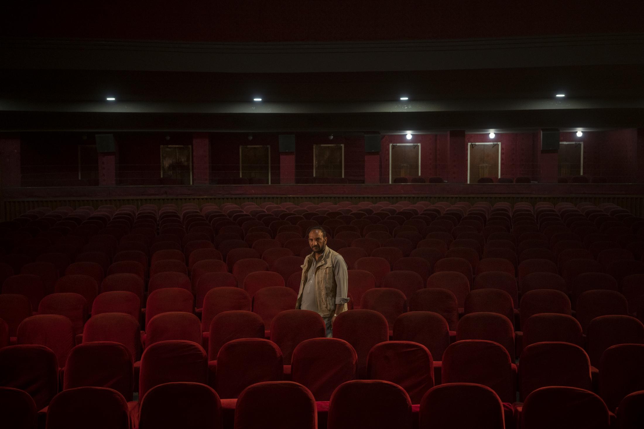 The Cinema of Kabul - Gul Mohammed, who works as a host in the Ariana Cinema,...