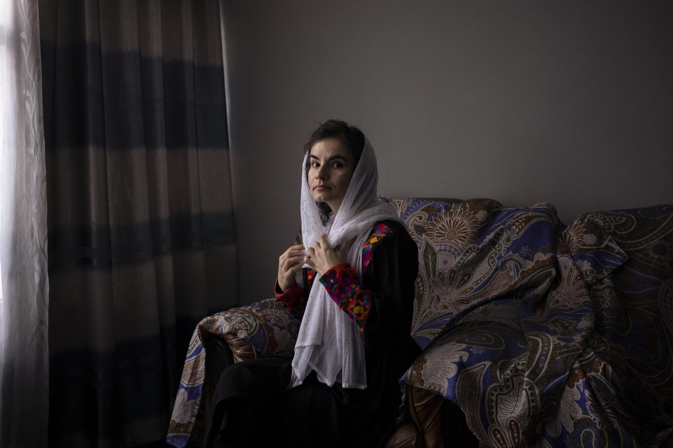 The Cinema of Kabul - Asita Ferdous sits inside her home in Kabul, Afghanistan...