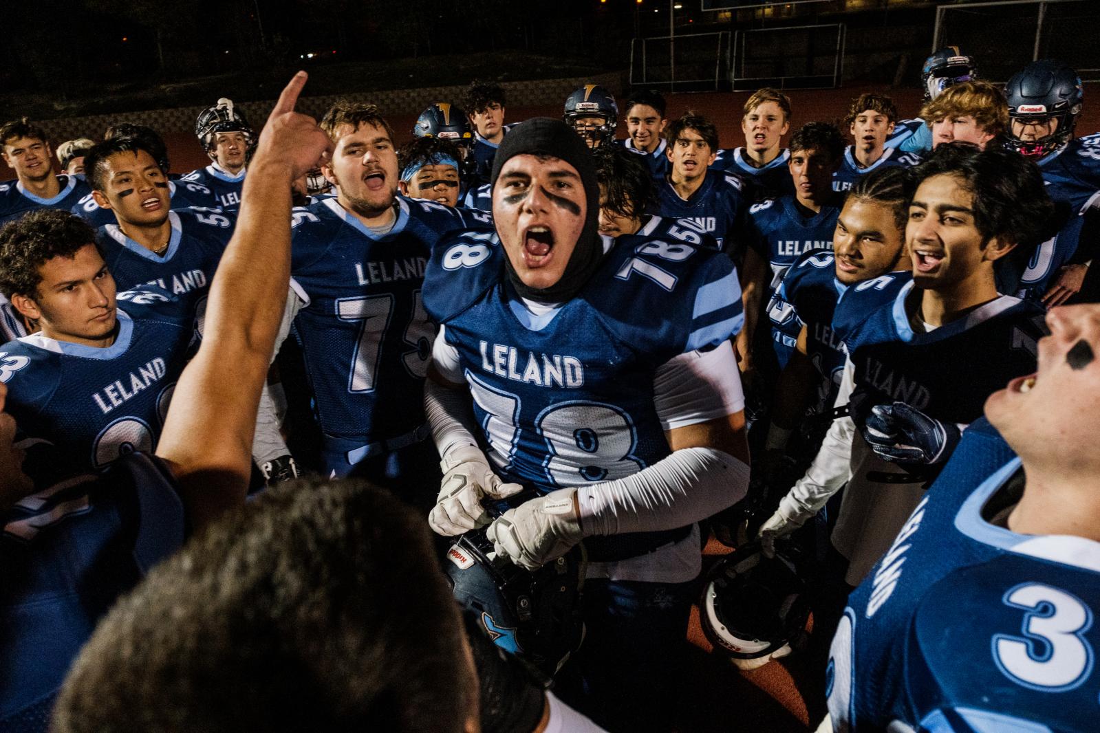 Image from SPORTS - Leland High School football players rally before a game...