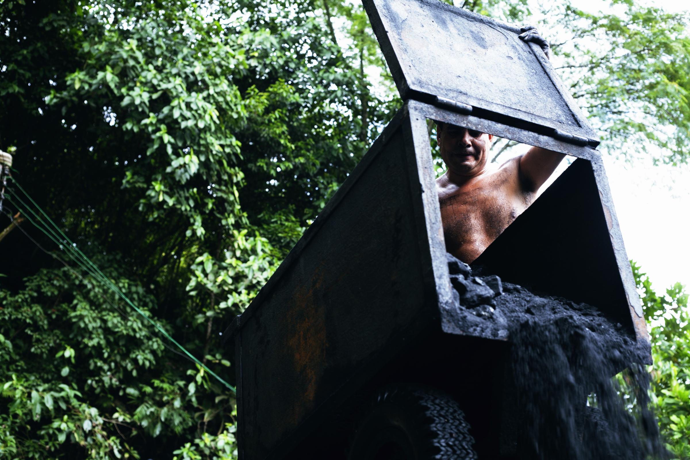 Muzo - Muzo, Boyacá, Colombia. A miner works with a cart...
