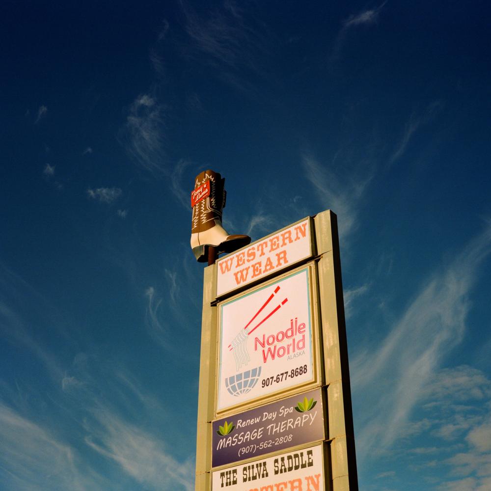 CALL HER ALASKA - Signs for a strip mall in Anchorage, Alaska. September...