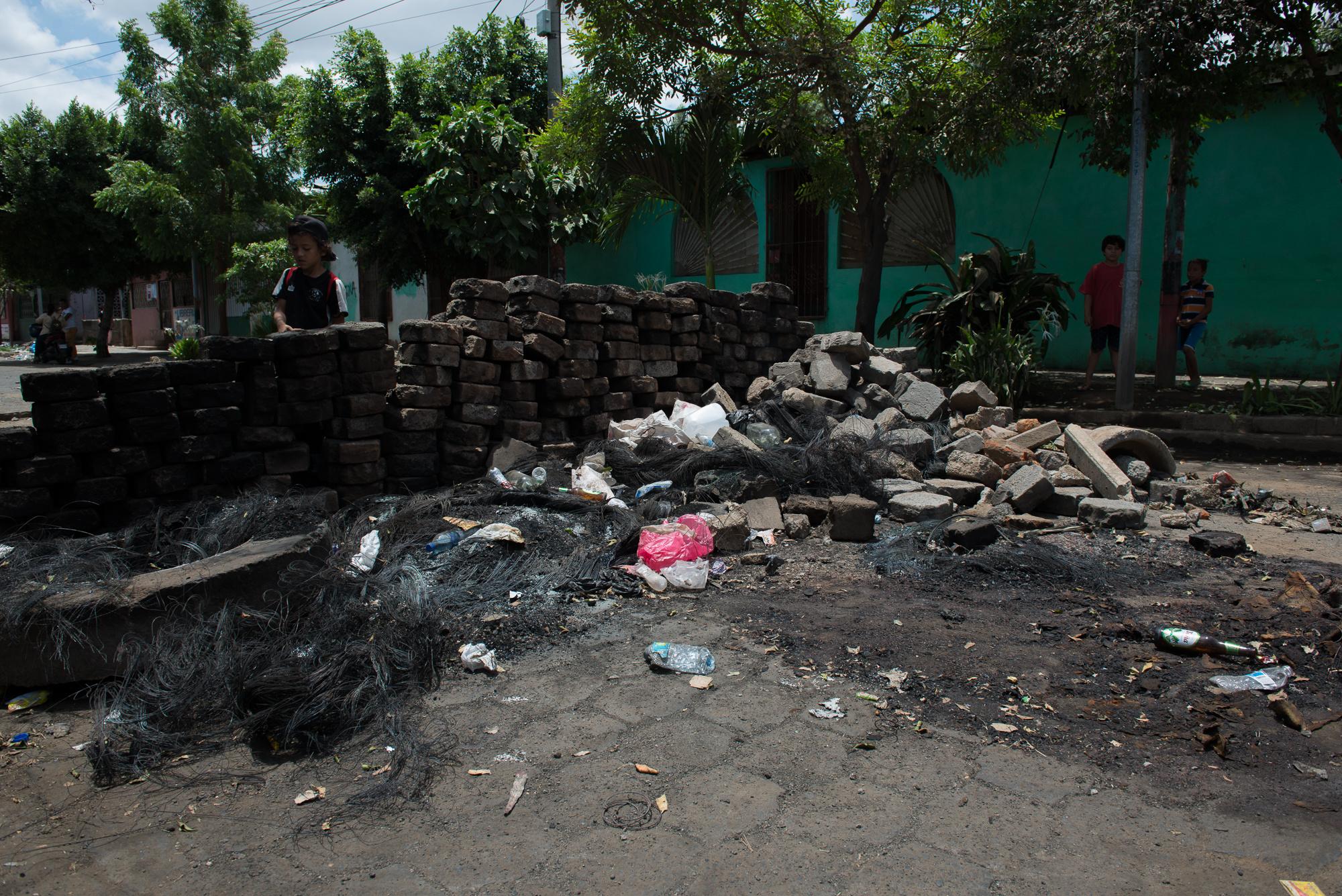 SOS Nicaragua - A neighbourhood barricade is pictured the morning after...