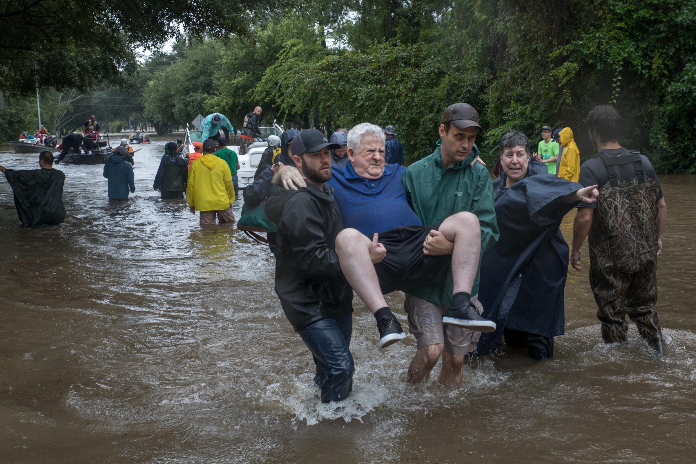 Hurricane Harvey - Residents of Kingwood, Texas are brought in to safety...