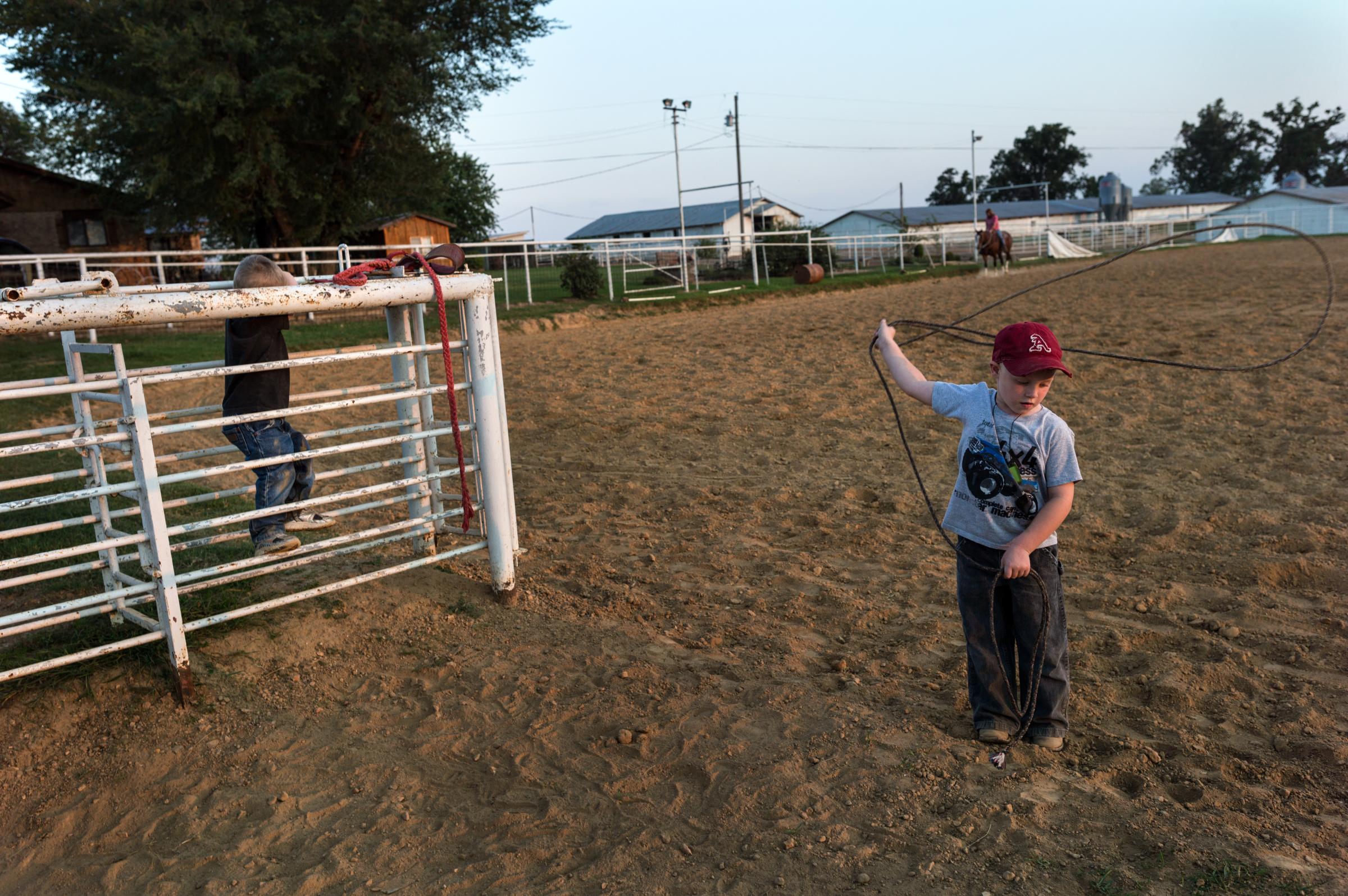 Land Bound in the Ozarks - Marlene and Virgil Moore keep a roping arena at their...