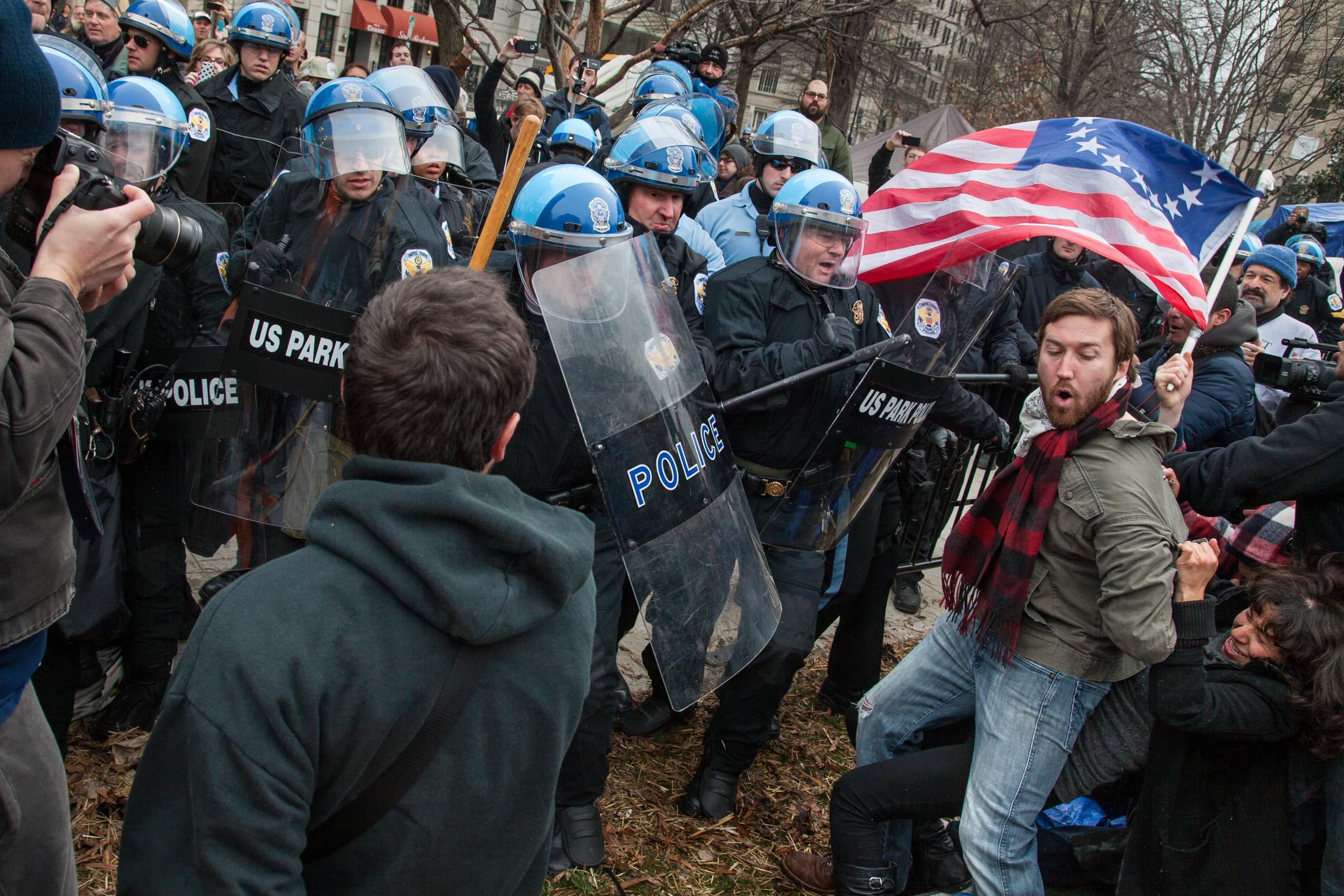 Occupy D.C. protestors resist U.S. Park Police clearing out areas of McPherson Square which the protestors have been occupying and living for the...