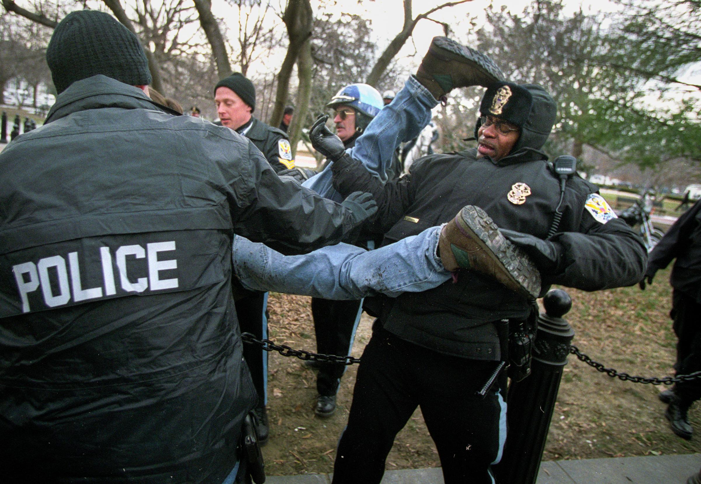 DC: City of Protests - A student protestor is tossed around and arrested after...