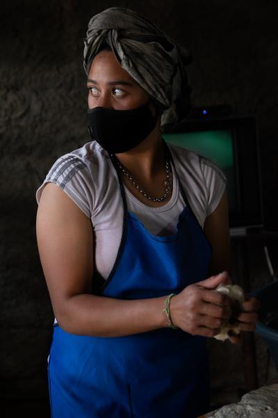 Martina Chapanay - Women in Martina Chapanay prepare pizza to sell in the slum and raise some money for their...