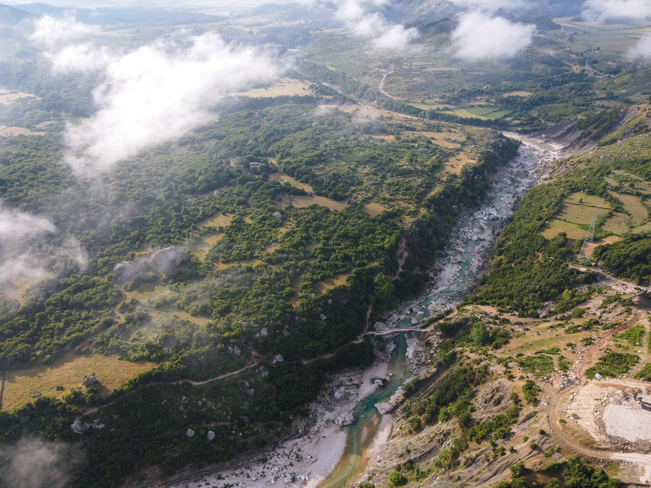 The Shushica river, near the village of Brataj in southern Albania. The Shushica is one of several unspoiled tributaries of the Vjosa, contributing to the natural functioning of the entire river system, and is still a crucial water source for local agricultural communities. Multiple small scale dams are slated for construction on the Shushica.