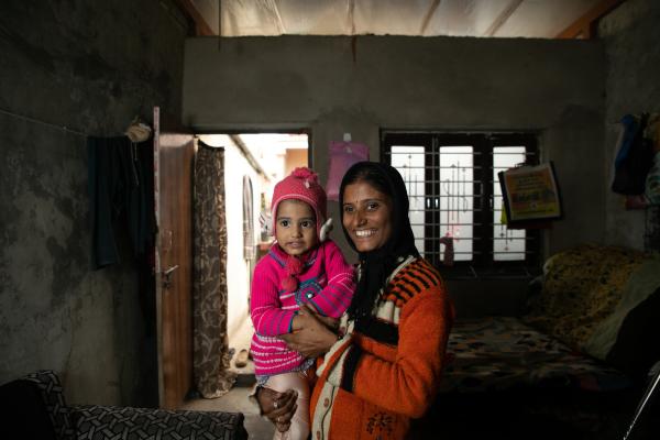 AEHMDABAD, GUJRAT, INDIA, (28/12/2021)- Portrait of Preeti Amit Verma and her niece Khusi Yogesh Sawaliya in lighter mood in their house where the roof is re-designed and re-structured by Re-Materials. Re-Materials designs and manufactures roofs which are eco friendly as it is made from Bio Plastic, Recycled Plastic and Cellulose composite which makes the roof drier in the monsoon season and up to 18 degrees Fahrenheit cooler in the summer. These roofs are also cost efficient addressing the needs of approximately 16 million Indians. 
