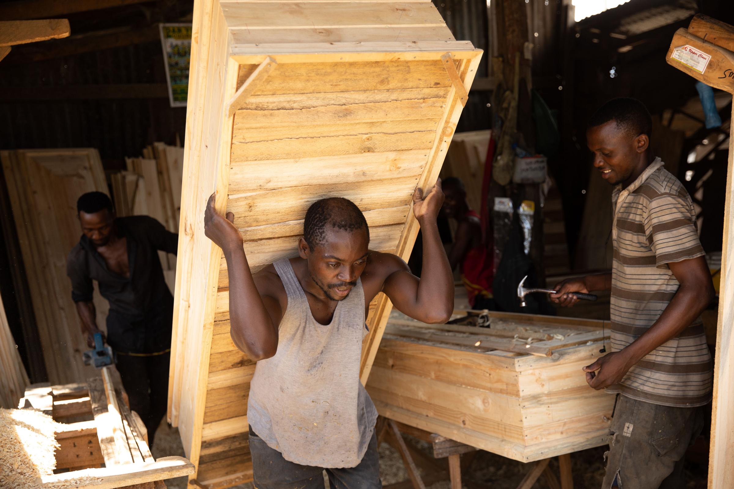 Covid Coverup - Coffins being made in the Manzese district of Dar Es Salaam, Tanzania on 27 October 2021. The...