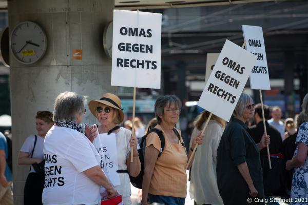BERLIN, GERMANY- APRIL 05: Members of Omas gegen Rechts (Grannies against the Right) congregate at the World Clock in Alexanderplatz, Berlin, for their monthly &quot;Mahnwache&quot; (Vigil), 2019. The initiative Omas gegen Rechts was founded in Vienna in 2017 by journalist Susanne Scholl and Monika Salzer, a retired pastor. Salzer said that it was in response to the coalition of the Austrian People&#39;s Party and the Freedom Party of Austria during the first Kurz government. A German initiative of Omas Gegen Rechts was founded in 2018 initiated by former teacher Anna Ohnweiler. (Photo by Craig Stennett)