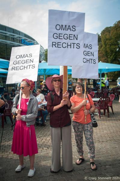 BERLIN, GERMANY-AUGUST 18:Omas gegen Rechts (Grannies against the Right) protesting against the &quot;Rudolf Hess Memorial March&quot;, 2018. Neo Nazis try to hold the Hess March annually to commemorate the death of Hitler&#39;s WW2 deputy Rudolf Hess by suicide in 1987, while he was still an inmate of Spandau Prison for war crimes of the second world war. The initiative Omas gegen Rechts was founded in Vienna in 2017 by journalist Susanne Scholl and Monika Salzer, a retired pastor. Salzer said that it was in response to the coalition of the Austrian People&#39;s Party and the Freedom Party of Austria during the first Kurz government. A German initiative of Omas Gegen Rechts was founded in 2018 initiated by former teacher Anna Ohnweiler. (Photo by Craig Stennett/Getty Images)