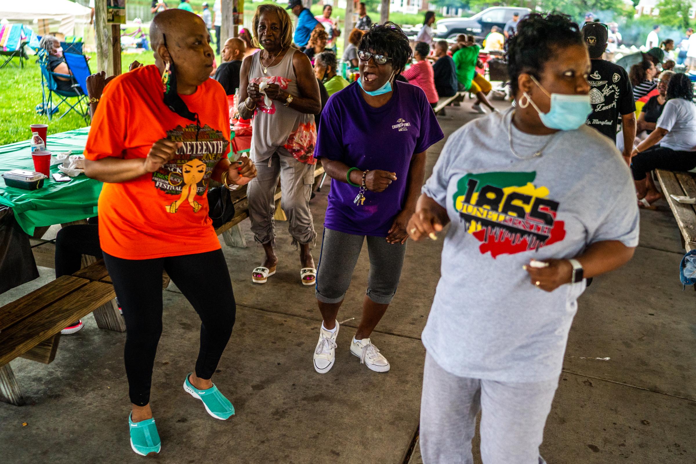 A group of women dance at Turner Station&rsquo;s Juneteenth Party on June 19, 2021 in Turner Station Park. &ldquo;We wanted to tell people to put your guns down and love one another,&rdquo; said Chanetta Reed, one of the event organizers (not pictured). &ldquo;That&rsquo;s why we did this, so we could love on one another. &hellip; This is my community.&rdquo;