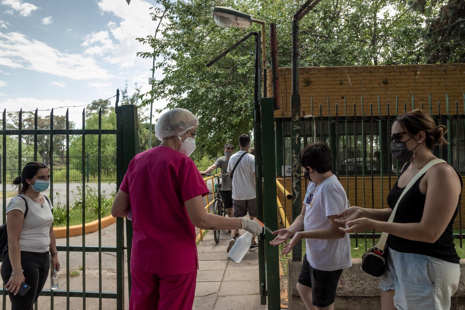 A healthcare worker give alcoho...Anita Pouchard Serra/ Bloomberg
