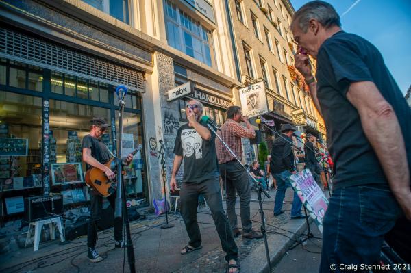 BERLIN, GERMANY-AUGUST 12:The musical group Nasenfl&ouml;ten play at the protest &#39;Volle Breiseite 4 Kisch &amp; Co&#39;- &#39;Full Broadside 4 Kisch &amp; Co&#39; outside Kisch &amp; Co Bookshop in Oranienstra&szlig;e, Kreuzberg, Berlin in 2020. The bookshop Kisch &amp; Co has been a fixture of Oranienstra&szlig;e in Kreuzberg for over 23 years. Its tenancy was under threat by property developers who bought up the building and issued unsustanable new contracts. Kisch &amp; Co tenancy ran out at the end of May, 2020. Moabit Criminal Court in Berlin later adjudicated on the dispute. The court instructed that the bookshop must leave the premises in Oranienstra&szlig;e and also pay the costs of the proceedings.(Photo by Craig Stennett/Getty Images)