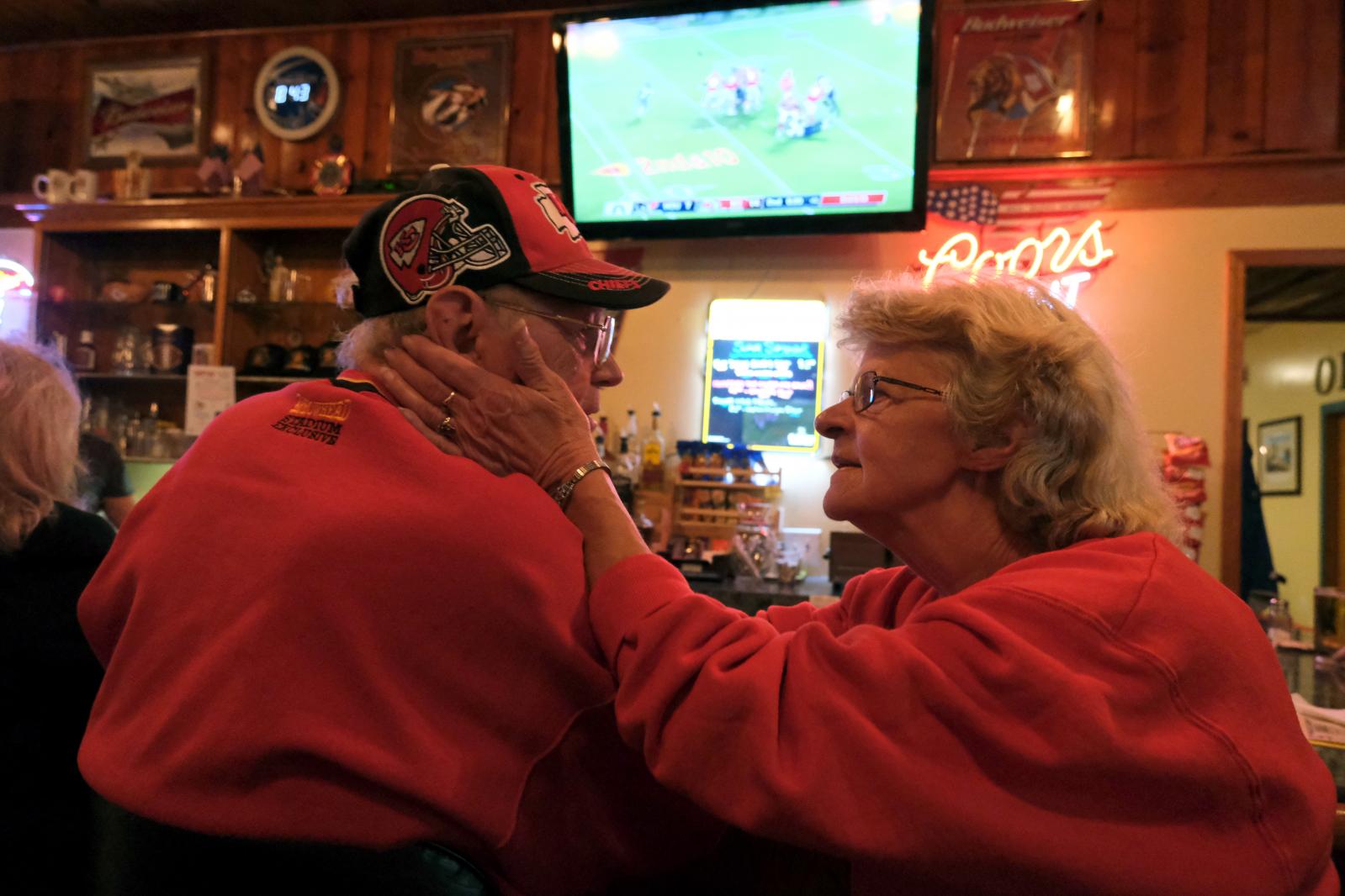 Portraits - A couple shares an intimate moment at the VFW on the...