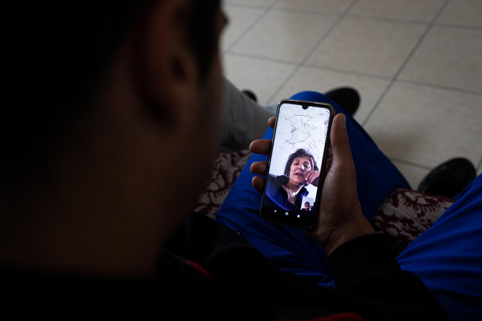 F&aacute;bio talks with his mother during one of their daily video calls from Ponta Delgada,...