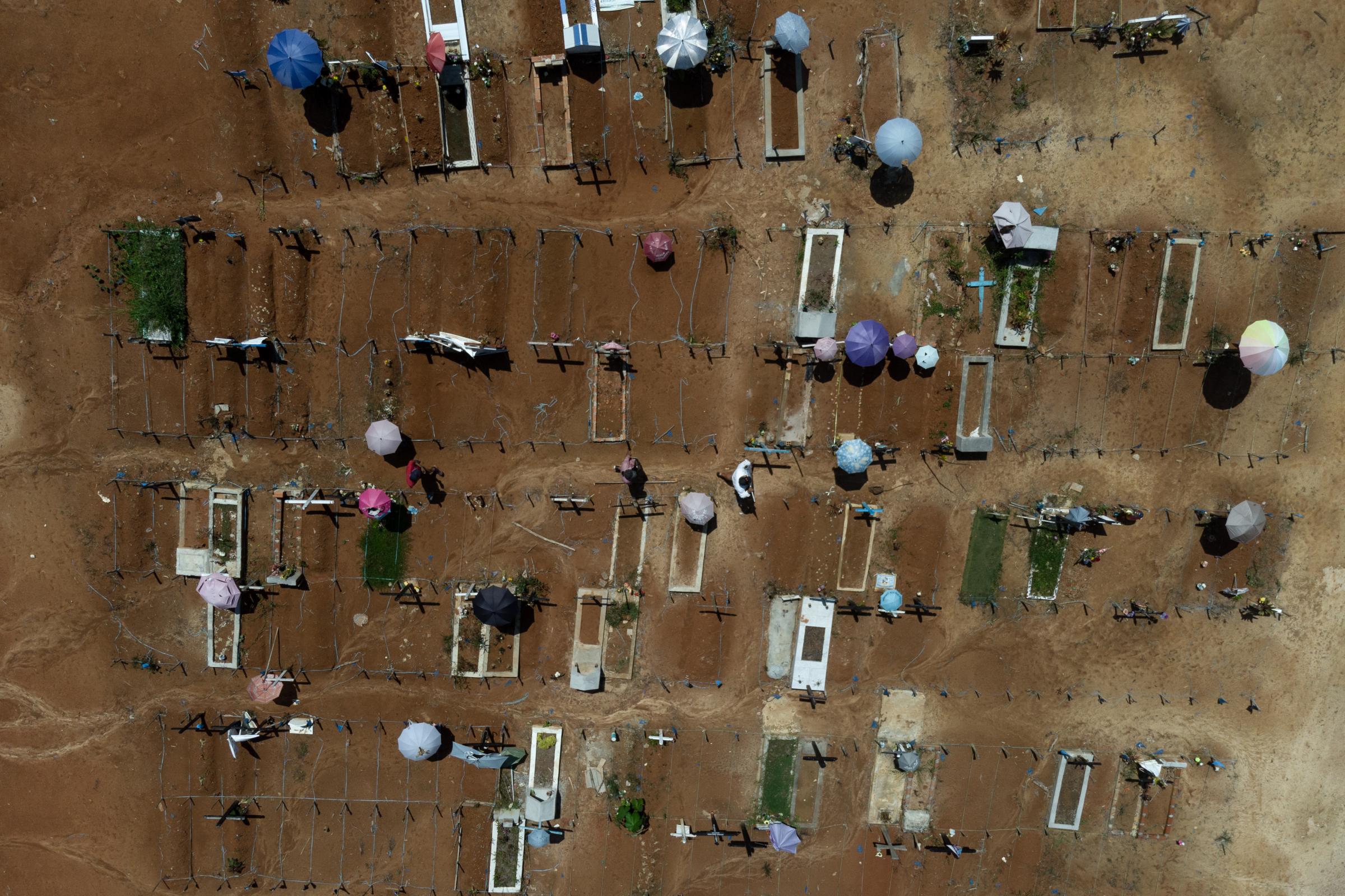 Vaccinators in Peru's Amazon are challenged by religion, rivers and a special tea - Panoramic view of the mass graves in the cemetery named &#39;Covid 19&#39; created in...