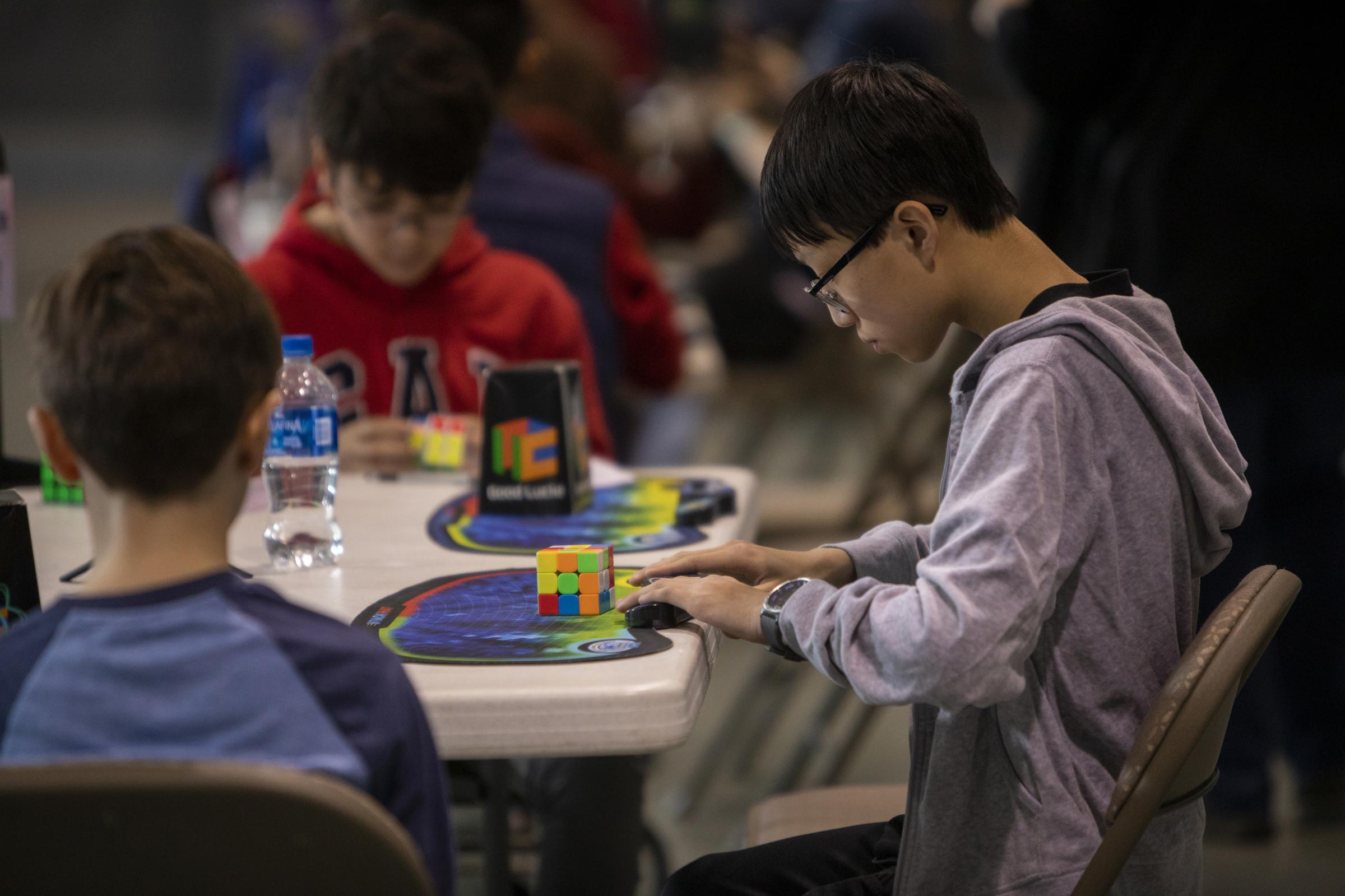 Speedcubers - Cubers start a competitive solve with their hands on the timer. Once their hands are lifted, the...