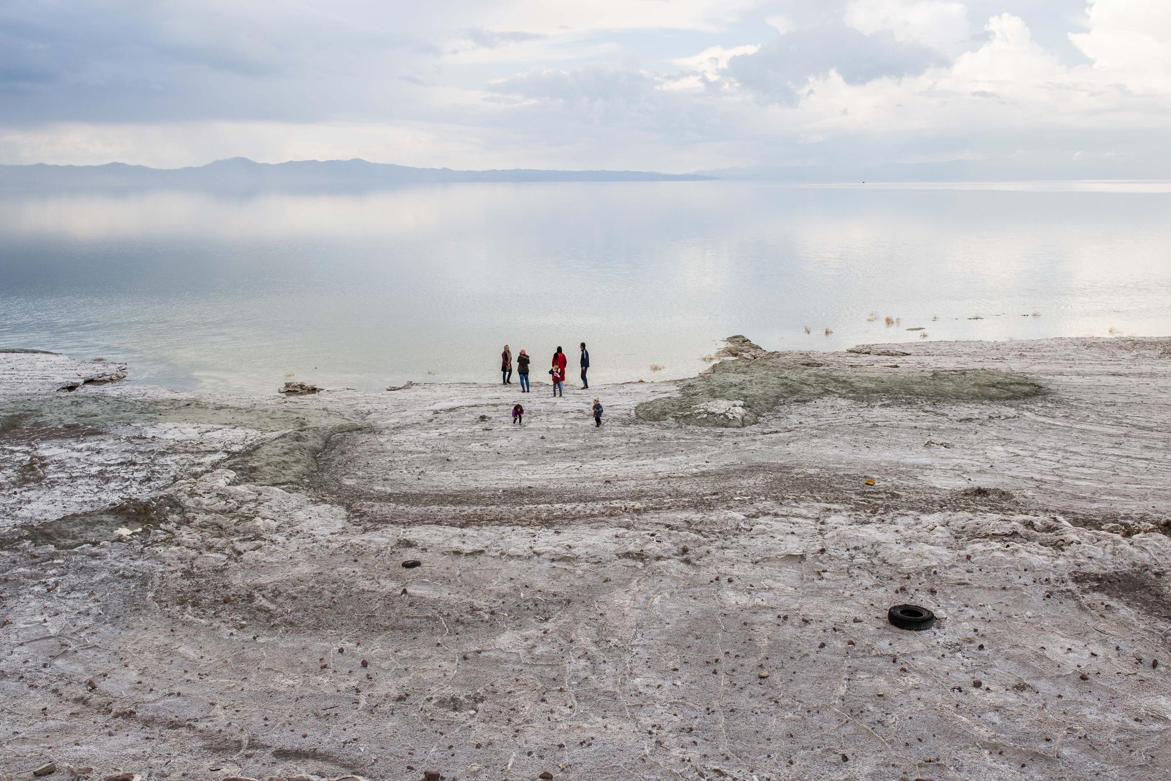 People came to visit lake Urmia and to take pictures from what remains of it. Lake Urmia is showing signs of recovery in some small parts because of heavy rainfalls. Lake Urmia, West -Azerbaijan, Iran. 2016