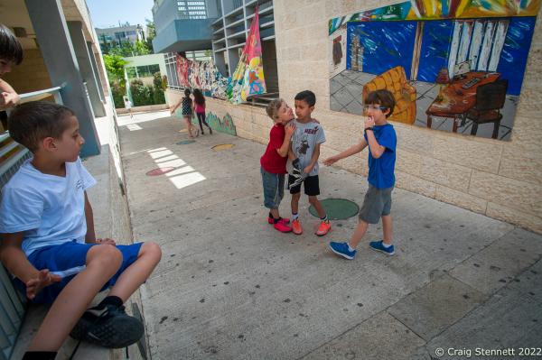 JERUSALEM, ISRAEL-JUNE 02: Arab and Jewish Israeli children playing together during break time at the mixed religion Hand in Hand School in Jerusalem, Israel on June 2nd, 2016. The Hand in Hand educational School concept was given birth in 1997 by Amin Khalaf, an Arab teacher and lecturer, and Lee Gordon, a Jewish-American social activist, after they met while working in their respective fields promoting Arab-Jewish dialogue in Israel. The schools they pioneered host an equal number of Jewish and Arab students respectively. Two teachers simultaneously in both Arabic and Hebrew teach the lessons. Judaism, Islam and also Christianity are taught with equal weight to all students, and each faith&rsquo;s respective religious holidays are also observed. Emphasis is given not only to one&rsquo;s own culture and language but also to those of the &quot;other&quot;. The children study two accounts of history: the creation of the &quot;Jewish homeland&quot; as well as the narrative of the Palestinian struggle. (Photo by Craig Stennett/Getty Images)