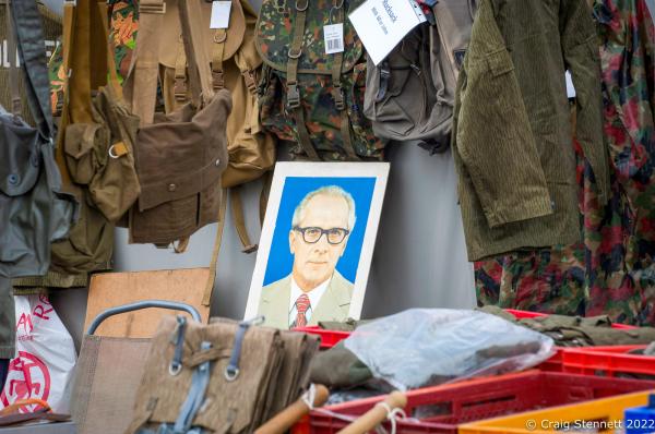 ZWICKAU, GERMANY- AUGUST 31: DDR nostalgia with a portrait of the Deutch Democratic Republic&#39;s last leader Erich Honecke on display at a memorabilia stall at Trabant Club Zwickau&#39;s car rally in Zwickau, Saxony, Germany in 2018. The first Trabant rolled out of the VEB Sachsenring Automobilwerke Zwickau factory in Saxony, Eastern Germany, on 7 November 1957. All the various models of Trabant were built in Zwickau, totalling 3,096,999 completed cars. This iconic car is often seen as symbolic for the GDR. The production finally stopped 1990 following German re-unification. Often referred to as &quot;a spark plug with a roof&quot; Trabants were constructed from a hard plastic body mounted on a one-piece steel chassis and not from compressed cardboard as is often rumoured. It had front-wheel drive, a transverse engine, and independent suspension which were unusual and innovative production features for the time. In the early &#39;90s it was possible to buy a Trabi for a few Deutschmarks. Prices later recovered as the Trabi gained cult status. Today Trabants are starting to fetch prices equivalent with other classic cars. (Photo by Craig Stennett/Getty Images)
