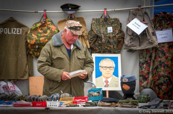 ZWICKAU, GERMANY- AUGUST 31: DDR nostalgia with a portrait of the Deutch Democratic Republic&#39;s last leader Erich Honecke on display at a memorabilia stall at Trabant Club Zwickau&#39;s car rally in Zwickau, Saxony, Germany in 2018. The first Trabant rolled out of the VEB Sachsenring Automobilwerke Zwickau factory in Saxony, Eastern Germany, on 7 November 1957. All the various models of Trabant were built in Zwickau, totalling 3,096,999 completed cars. This iconic car is often seen as symbolic for the GDR. The production finally stopped 1990 following German re-unification. Often referred to as &quot;a spark plug with a roof&quot; Trabants were constructed from a hard plastic body mounted on a one-piece steel chassis and not from compressed cardboard as is often rumoured. It had front-wheel drive, a transverse engine, and independent suspension which were unusual and innovative production features for the time. In the early &#39;90s it was possible to buy a Trabi for a few Deutschmarks. Prices later recovered as the Trabi gained cult status. Today Trabants are starting to fetch prices equivalent with other classic cars. (Photo by Craig Stennett/Getty Images)