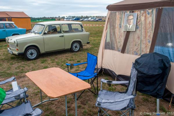 ZWICKAU, GERMANY- AUGUST 31: DDR nostalgia at Trabant Club Zwickau&#39;s car rally in Zwickau, Saxony, Germany in 2018 . Erich Honecker the last leader of the DDR before unification and his portrait is on display on a participants tent. The first Trabant rolled out of the VEB Sachsenring Automobilwerke Zwickau factory in Saxony, Eastern Germany, on 7 November 1957. All the various models of Trabant were built in Zwickau, totalling 3,096,999 completed cars. This iconic car is often seen as symbolic for the GDR. The production finally stopped 1990 following German re-unification. Often referred to as &quot;a spark plug with a roof&quot; Trabants were constructed from a hard plastic body mounted on a one-piece steel chassis and not from compressed cardboard as is often rumoured. It had front-wheel drive, a transverse engine, and independent suspension which were unusual and innovative production features for the time. In the early &#39;90s it was possible to buy a Trabi for a few Deutschmarks. Prices later recovered as the Trabi gained cult status. Today Trabants are starting to fetch prices equivalent with other classic cars. (Photo by Craig Stennett/Getty Images)