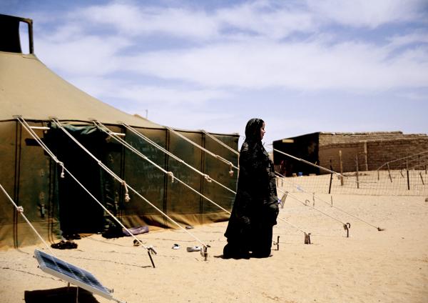 Daughters of the clouds - Mariam, Minister of Culture outside her tent in the Western Saharawi refugee camps of Tindouf,...