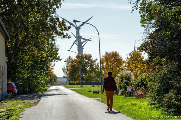 Image from Feldheim, Germany 100% Energy self-sufficient-Getty Editorial - FELDHEIM, GERMANY-OCTOBER 13: A member of the public...