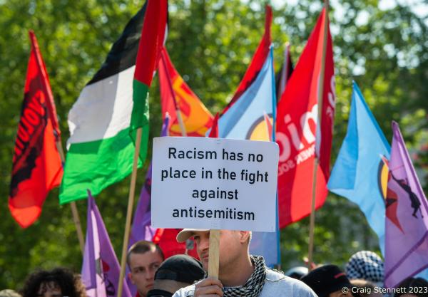 Jewish Berliners show support for Palestinian rights. - BERLIN, GERMANY - MAY 20: A man holds a banner at a...