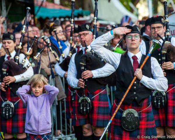 Highland Gathering - Peine, Lower Saxony, Germany - PEINE,GERMANY - MAY 06: A young girl finds the Pipe Bands...