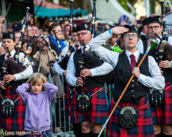 Image from Deutsch Dudelsackspieler - PEINE,GERMANY - MAY 06: A young girl finds the Pipe Bands...