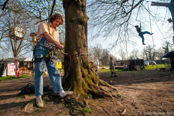 L&Uuml;TZERATH, GERMANY- MARCH 24: Enviromental protesters practice rope climbing skills in order to reach the tree houses at the environmental protest camp of &#39;Mahnwache L&uuml;tzerath&#39; on March 24, 2022 in L&uuml;tzerath, Nordrhein-Westfalen, Germany. The environmental camp was set up in 2020 on the land of L&uuml;tzerath Farmer Eckart Heukamp to protest against the expansion of the Garzweiler open-cast lignite mine. Most of the former properties in L&uuml;tzerath have already been demolished to make way for the mine but Eckart Heukamp has contested the RWEs (the energy provider who owns the mine) right to forcibly take his farm. The case is currently progressing through the German court system. (Photo by Craig Stennett/Getty Images)