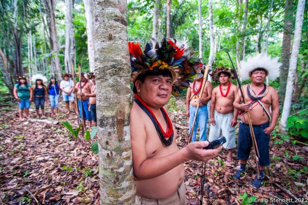 LAPETANHA, BRAZIL-OCTOBER 25: Paiter-Surui Chief Almir Narayamoga Surui with members of his indegenous indian tribe in the Amazon Rainforest at the &quot;7th September Indian Reserve&quot; Rond&ocirc;nia, Brazil on October 25th, 2010. The tribe had a 50 year plan to halt illegal logging on their land and plant a million trees in order to return their part of the Amazon rainforest back to its pristine condition through the financing earned from carbon offsetting. Indigenous people have contributed less to climate change than has any other section of the population, yet they are among those most in jeopardy from its impacts. REDD+ stands for &ldquo;Reducing Emissions from Deforestation and Degradation&quot; and it is enshrined in the 2015 Paris Climate Agreement. The &quot;Forest Carbon Project&quot;, was initiated by the Patier-Surui in 2009 and was the first indigenous-led conservation project financed through the sale of carbon offsets. It dramatically reduced deforestation within the territory of the Paiter-Surui during the first five years of operation (2009-2014), but was suspended in 2018 after the discovery of large gold deposits in the territory that sparked a surge in deforestation and a fracture in the indigenous tribe&#39;s unity on how to proceed. (Photo by Craig Stennett/Getty Images)
