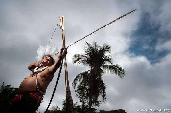 LAPETANHA, BRAZIL-OCTOBER 28: Moplip Surui from the Paiter-Surui tribe of indigenous Indians practices his archery skills with a traditional bow and arrow at the Paiiter-Surui village of Lapetanha in the &quot;7th September Indian Reserve&quot; Rond&ocirc;nia, Brazil on October 28th, 2010.The tribe had a 50 year plan to halt illegal logging on their land and plant a million trees in order to return their part of the Amazon rainforest back to its pristine condition through the financing earned from carbon offsetting. Indigenous people have contributed less to climate change than has any other section of the population, yet they are among those most in jeopardy from its impacts. REDD+ stands for &ldquo;Reducing Emissions from Deforestation and Degradation&quot; and it is enshrined in the 2015 Paris Climate Agreement. The &quot;Forest Carbon Project&quot;, was initiated by the Patier-Surui in 2009 and was the first indigenous-led conservation project financed through the sale of carbon offsets. It dramatically reduced deforestation within the territory of the Paiter-Surui during the first five years of operation (2009-2014), but was suspended in 2018 after the discovery of large gold deposits in the territory that sparked a surge in deforestation and a fracture in the indigenous tribe&#39;s unity on how to proceed. (Photo by Craig Stennett/Getty Images)