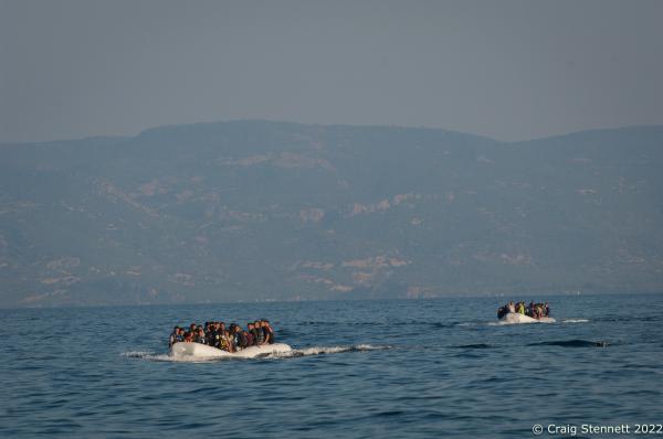 EFTALOU, GREECE-SEPTEMBER 20: Two refugee dingy&#39;s cross the Aegean sea from Turkey to the Greel Island of Lesbos in 2015. Arriving at Limanaki Beach in Eftalou, Lesbos, Greece. In all, over 1 million refugees and migrants crossed the Mediterranean (mostly the Aegean Sea) in 2015, three to four times more than the previous year. 80% were fleeing from wars in Syria, Iraq, and Afghanistan. About 85% of sea arrivals were in Greece via Turkey.(Photo by Craig Stennett/Getty Images)