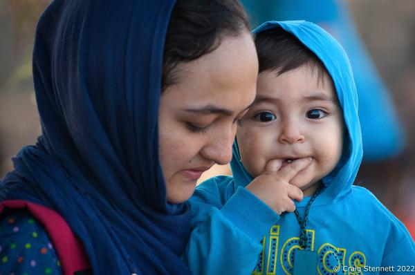 MYTILENE, GREECE-SEPTEMBER 20: An Afghan woman with her child at the refugee centre of &#39;PIKPA&#39; in Mytilene, Lesbos, Greece in 2015. In all, over 1 million refugees and migrants crossed the Mediterranean (mostly the Aegean Sea) in 2015, three to four times more than the previous year. 80% were fleeing from wars in Syria, Iraq, and Afghanistan. About 85% of sea arrivals were in Greece via Turkey.(Photo by Craig Stennett/Getty Images)