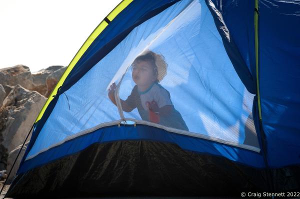 MYTILENE, GREECE-SEPTEMBER 17: With temperatures hitting 34 degrees centigrade at the Port of Mytilene on the Greek Island of Lesbos. Refugees from the 2015 Syrian war endure the heat while awaiting documentation processing and transport into mainland Greece. (Photo by Craig Stennett/Getty Images)