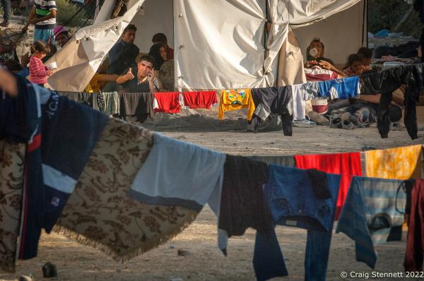 7 Days in Lesbos - MORIA REFUGEE CAMP, GREECE-SEPTEMBER 18: A refugee using...