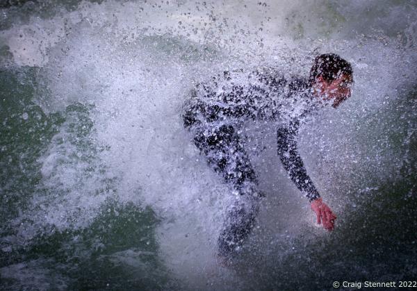 MUNICH, GERMANY - JUNE 15: A surfer at the Eisbachwelle in Munich, Bavaria in 2019. The Eisbach (Ice Brook) is a 2 kilometer man made river which is a canal tributary from the Isar River. It runs through Munich&lsquo;s Englischer Garten, a public park, and is the hub of the land locked city&rsquo;s surf scene The river, following enhancement from local surfers, produces a standing wave called the Eisbachwelle (Ice Brook Wave). It has been surfed in the city since the early 1970&rsquo;s. Munich now claims to be home to some 2000 full time surfers. (Photo by Craig Stennett/Getty Images)