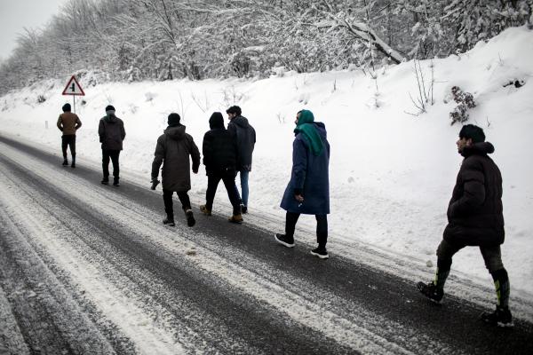 A group of Afghan refugees heading back from Bihac city towards Lipa camp for refugees and migrants stuck in Bosnia. They were pushed back by Croatian border police after trying to cross the border into Croatia a few days before. A few hundreds to a few thousands refugees and migrants live in the Lipa camp, some stay for a longer period, others for a few days, then try to cross the Bosnian-Croatian border.