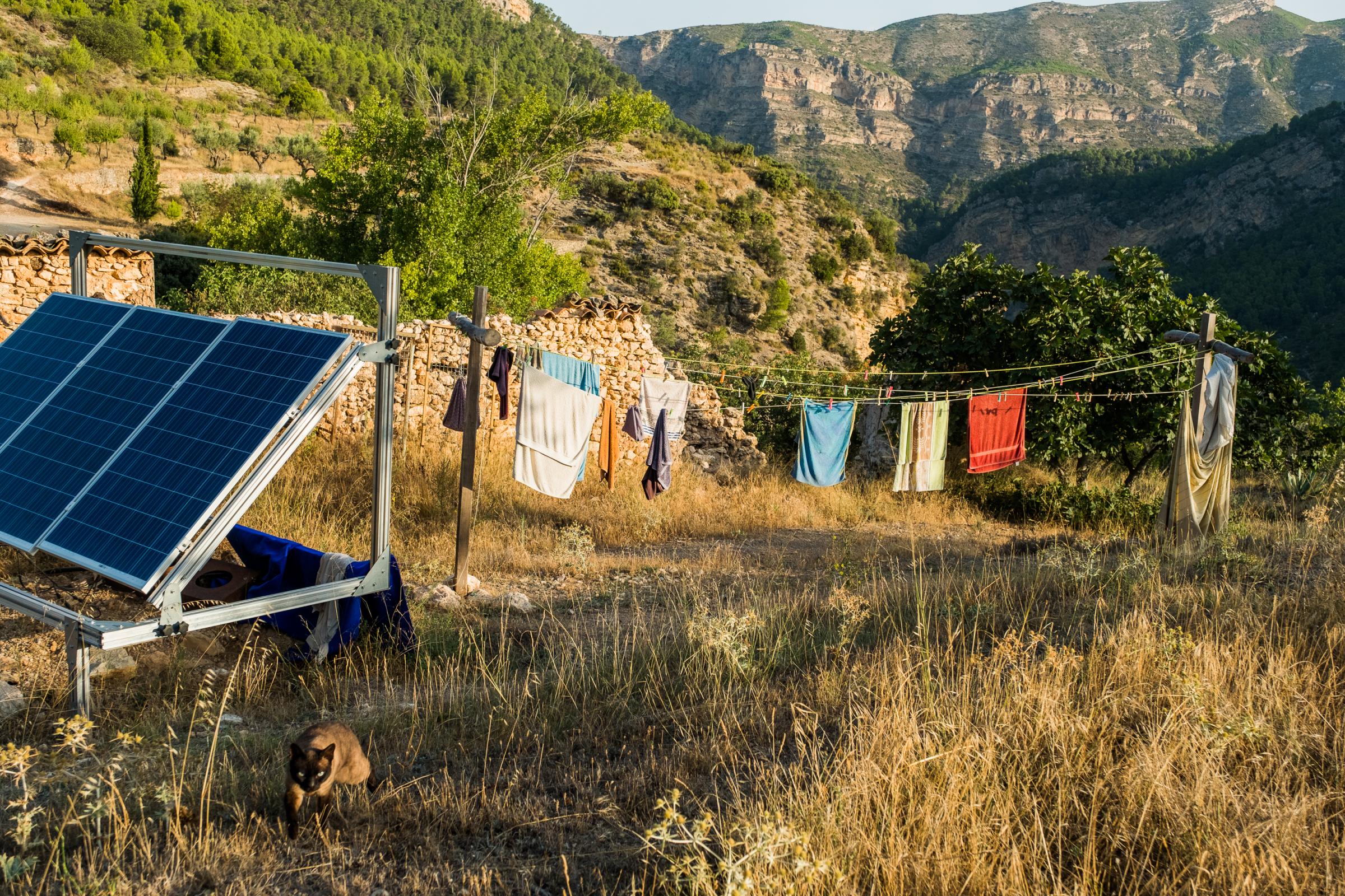 Rutopia - Spain - Wash is drying in the sun, close to the solar panels in...